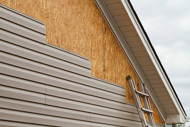 Professional Emergency Siding Repair technician working in Refton, PA